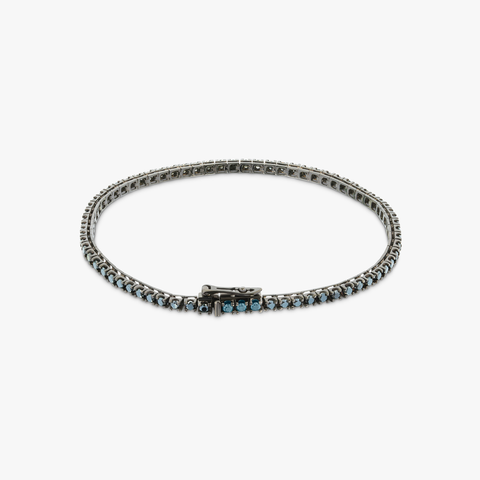 Tennisarmband aus 18 Karat Weißgold, schwarz rhodiniert und blauen Diamanten